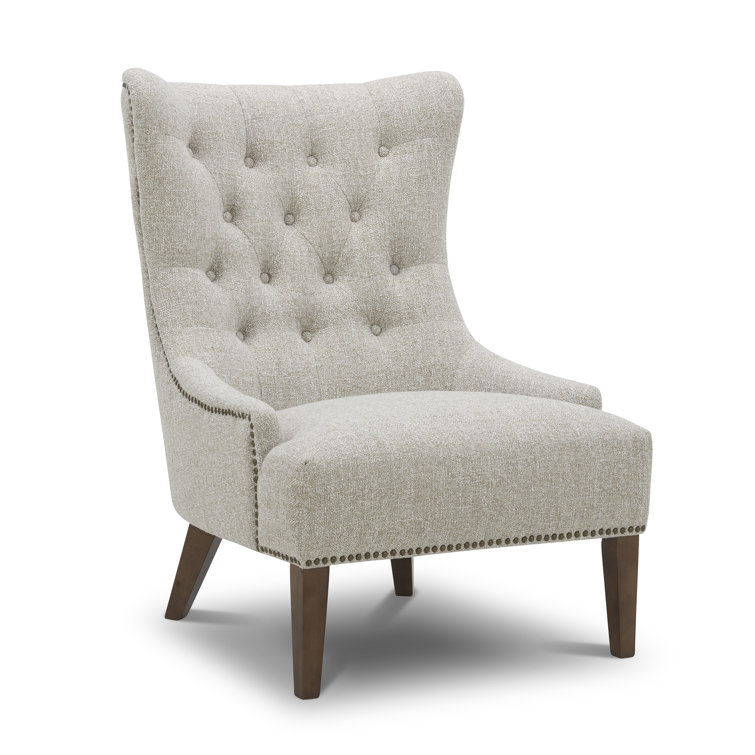 Grey tufted store wingback chair